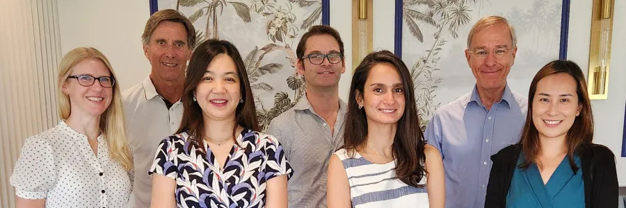 The NiPPeR study team, stood in a light and bright room. There are two rows with three men in the back and four women in the front.
