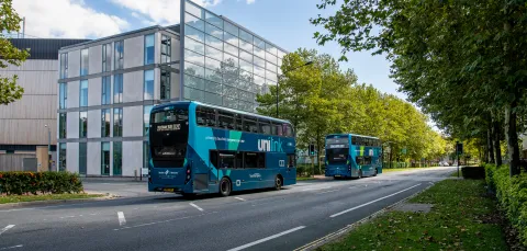 Unilink buses driving down University Road, Highfield Campus. 