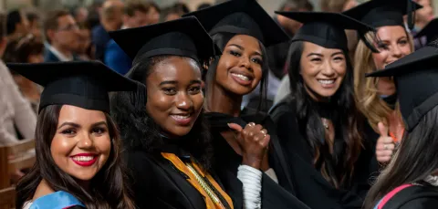 Smiling group at graduation ceremony Winchester Cathedral