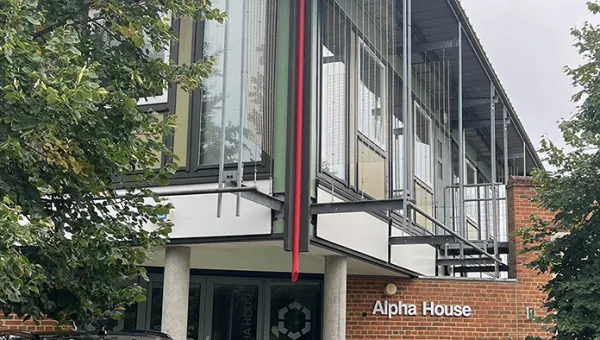 Exterior shot of the front of Alpha House in Chilworth