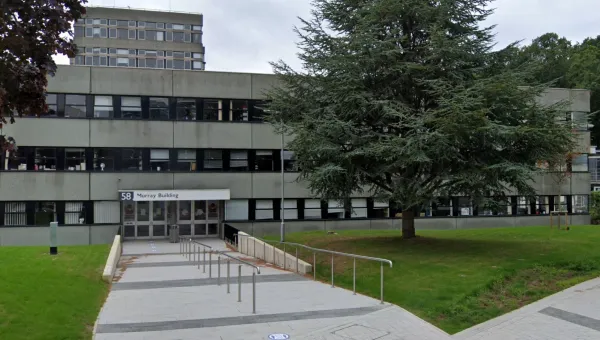 Outside shot of the Murray Building, a long, low 70s-style concrete builing