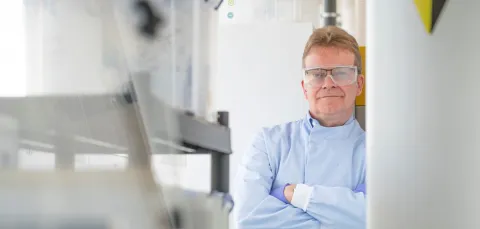 NOC consultant Andrew Cundy standing in a lab.