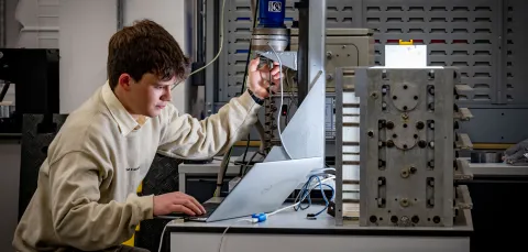 Timofey at work at a desk