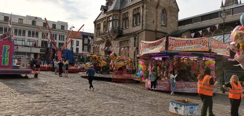 Wide shot of a market in a town centre