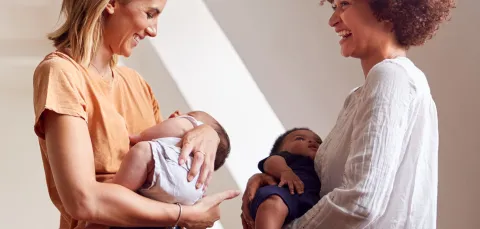 Early Years Centre parents holding babies