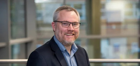 Gareth smiles at the camera