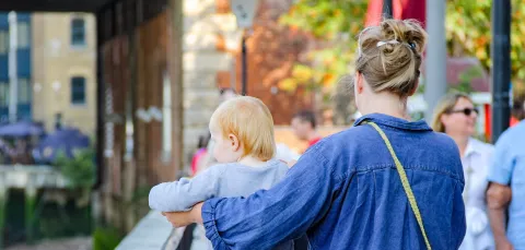 Mother walking with child