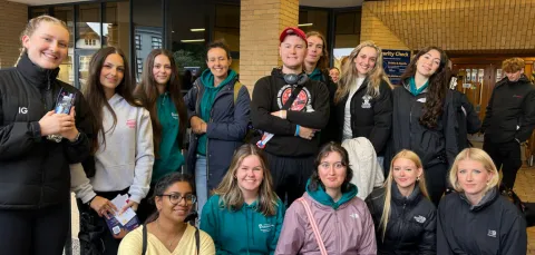A group of participants taking part in a charity walk