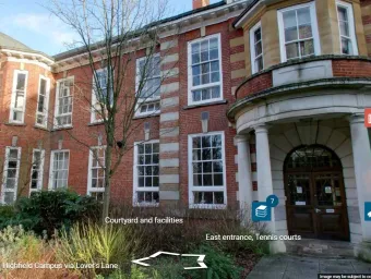 Exterior view of red brick academic building.