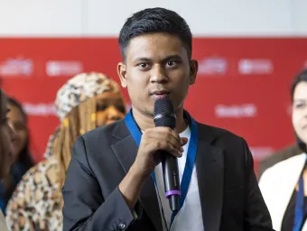 International student Karthik Saravan presenting at a conference