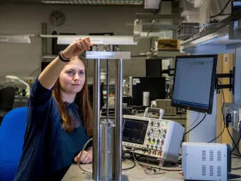 A person works in the physics lab