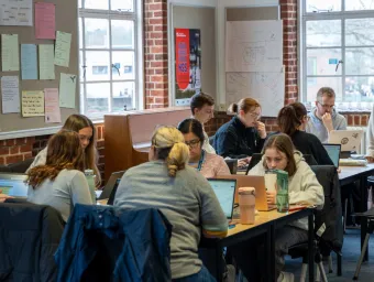 PGCE students working on tablets in a university based discussion session.