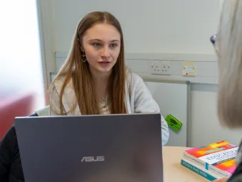 Mia in an education meeting