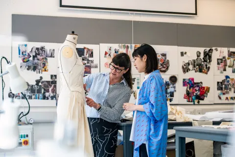 Student and tutor in fashion studio at WSA. 