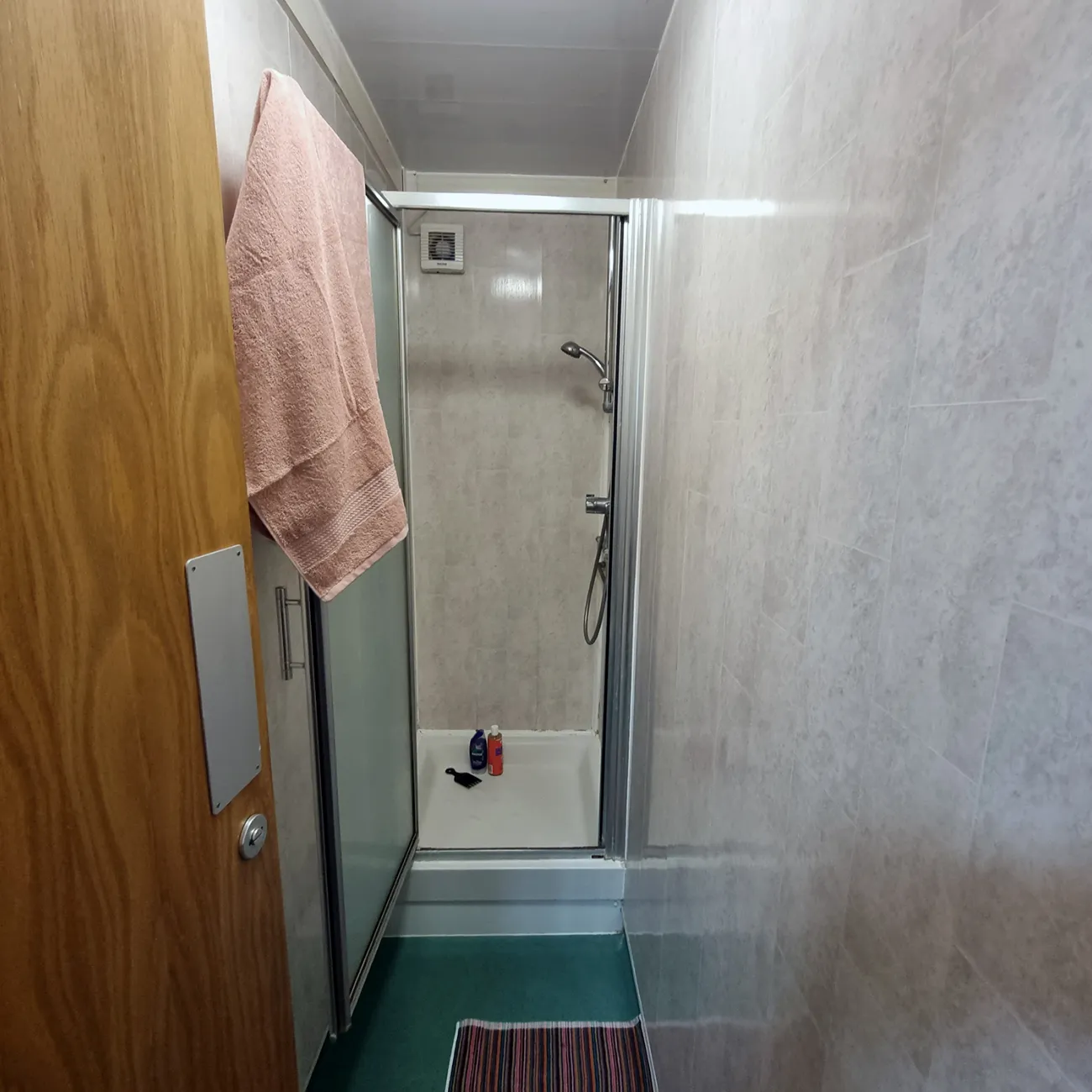 Enhanced shared bathroom with wash basin