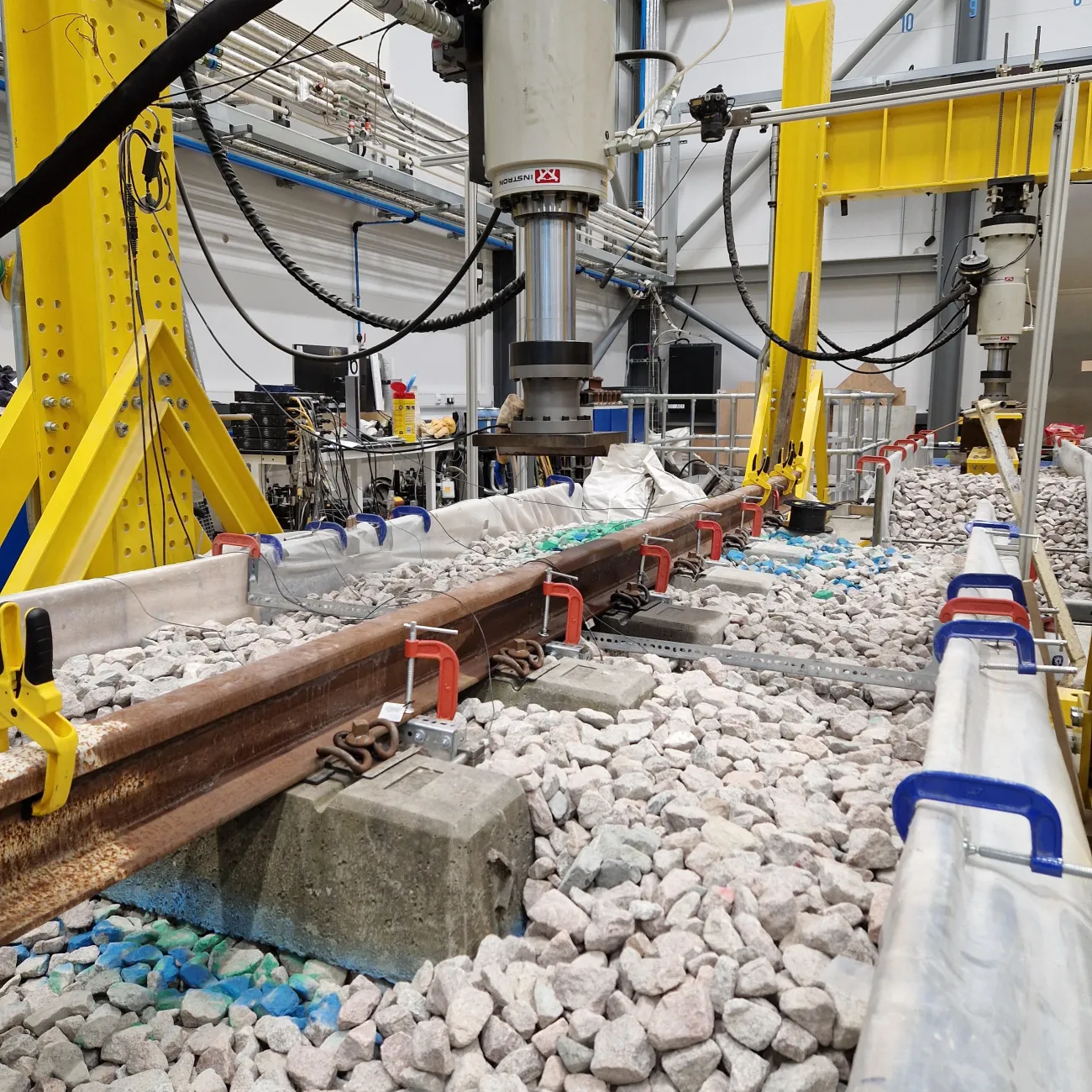 A portrait photo of a full-scale test track housed within the National Infrastructure Laboratory.