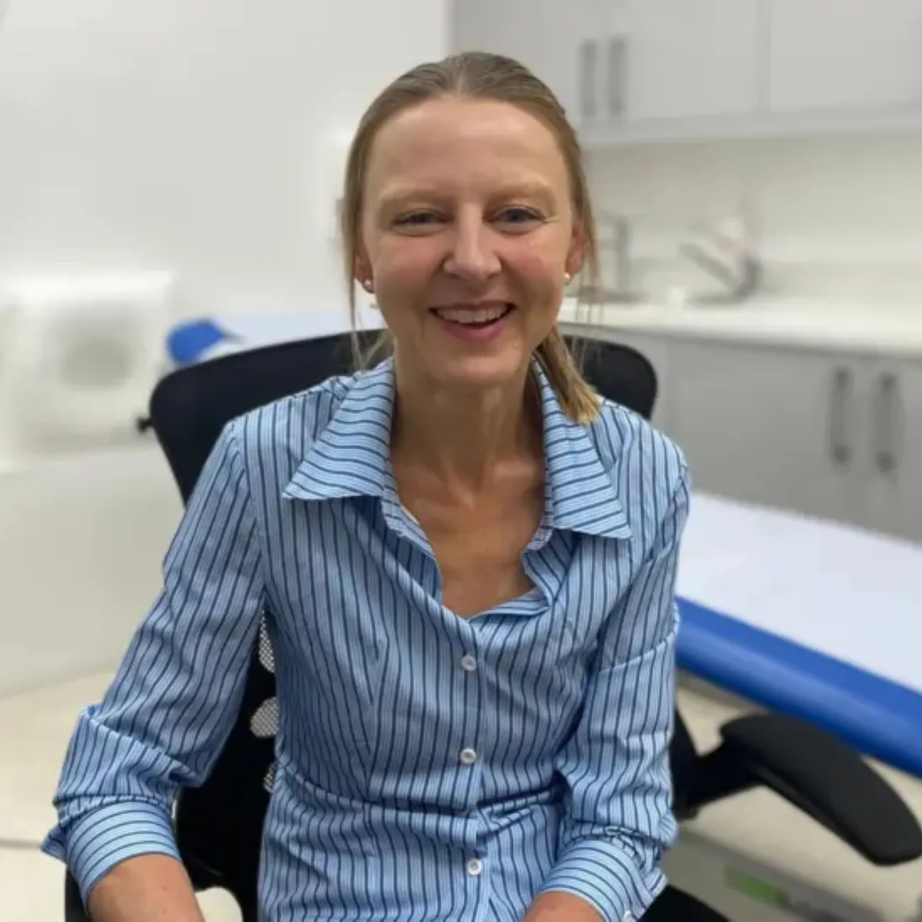 Vicky Carre sitting in her GP practice office