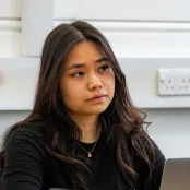 Head and shoulders portrait image of Frances Juat, BA Philosophy and Politics student looking at the camera.