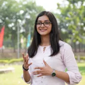 Saumya standing outside