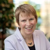 Sue smiling for the photo. 