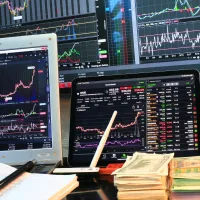 Stock markets index displaying on computer screens 