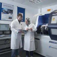 Researchers in the powder x-ray diffraction facility