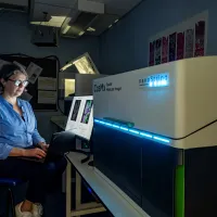 Patricia Goggin uses a high tech imaging device.